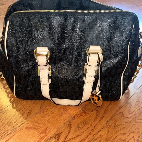 MICHAEL Michael Kors Handbags - Michael Kors handbag black & brown with gold hardware. With strap! Barely used!